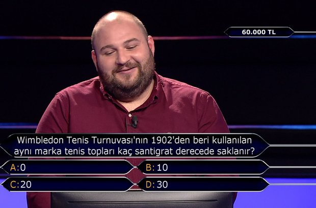 Wimbledon Tenis Turnuvası'nın 1902'den beri kullanılan aynı marka tenis topları kaç santigrat derecede saklanır?