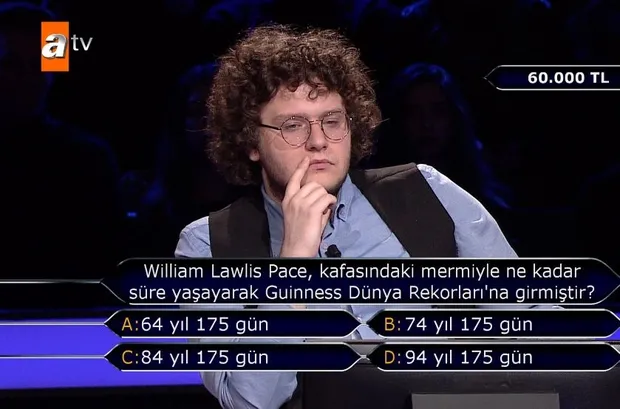 William Lawlis Pace, kafasındaki mermiyle ne kadar süre yaşayarak Guinness Dünya Rekorları'na girmiştir?